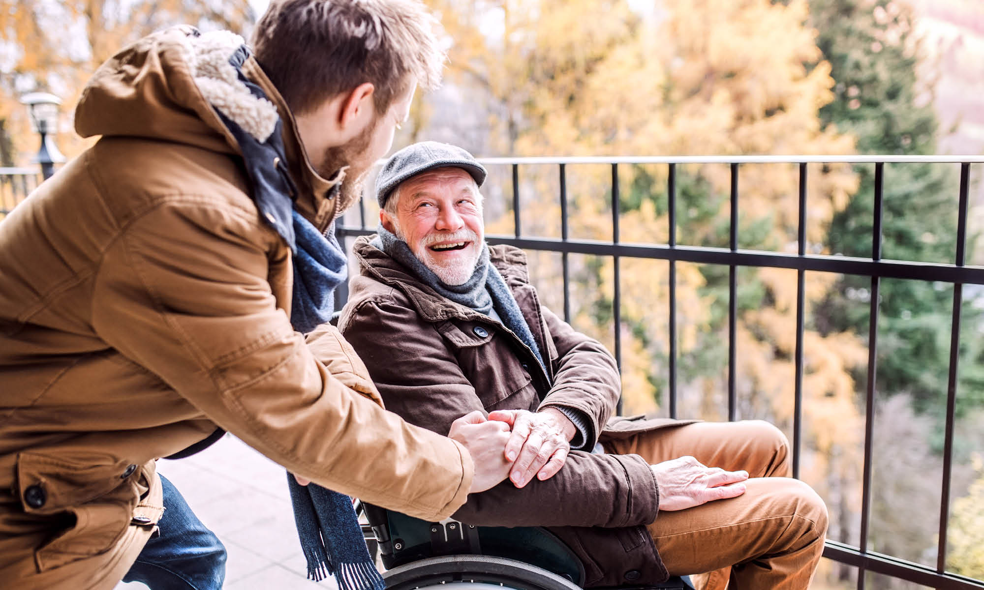 Hulp man in rolstoel Hulp man in rolstoel